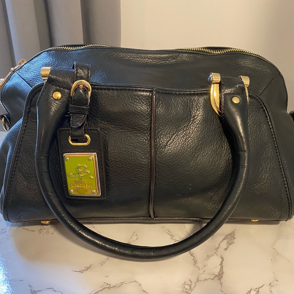 B. Makowsky black leather handbag